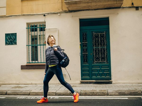 Person smiling and feeling energetic after daily activity